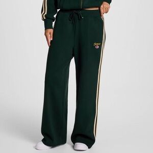 Champion Woman’s Wide Leg Track Pants in Dark Green with Yellow Stripes